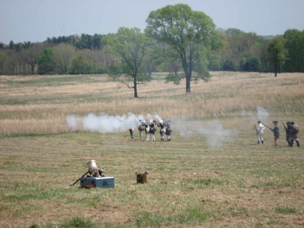 Park Rangers and members of the Oneida Indian Nation demonstrate a skirmish line on French Alliance Day.