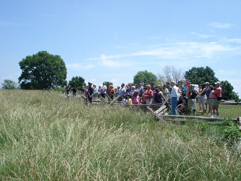 Speaker talks to visitors about arillery for March out program
