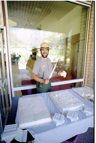Color Photos of the parks 72nd anniversary celebrations- cake cutting, barbecue, speakers.
