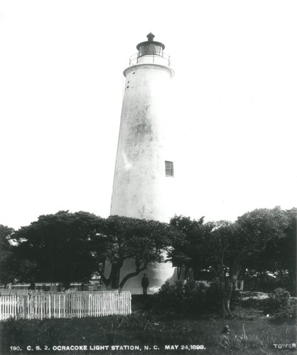 This photo of the Ocracoke Lighthouse, taken in 1893, shows the original granite foundation above grade, 60 years before it was covered in shotcrete.