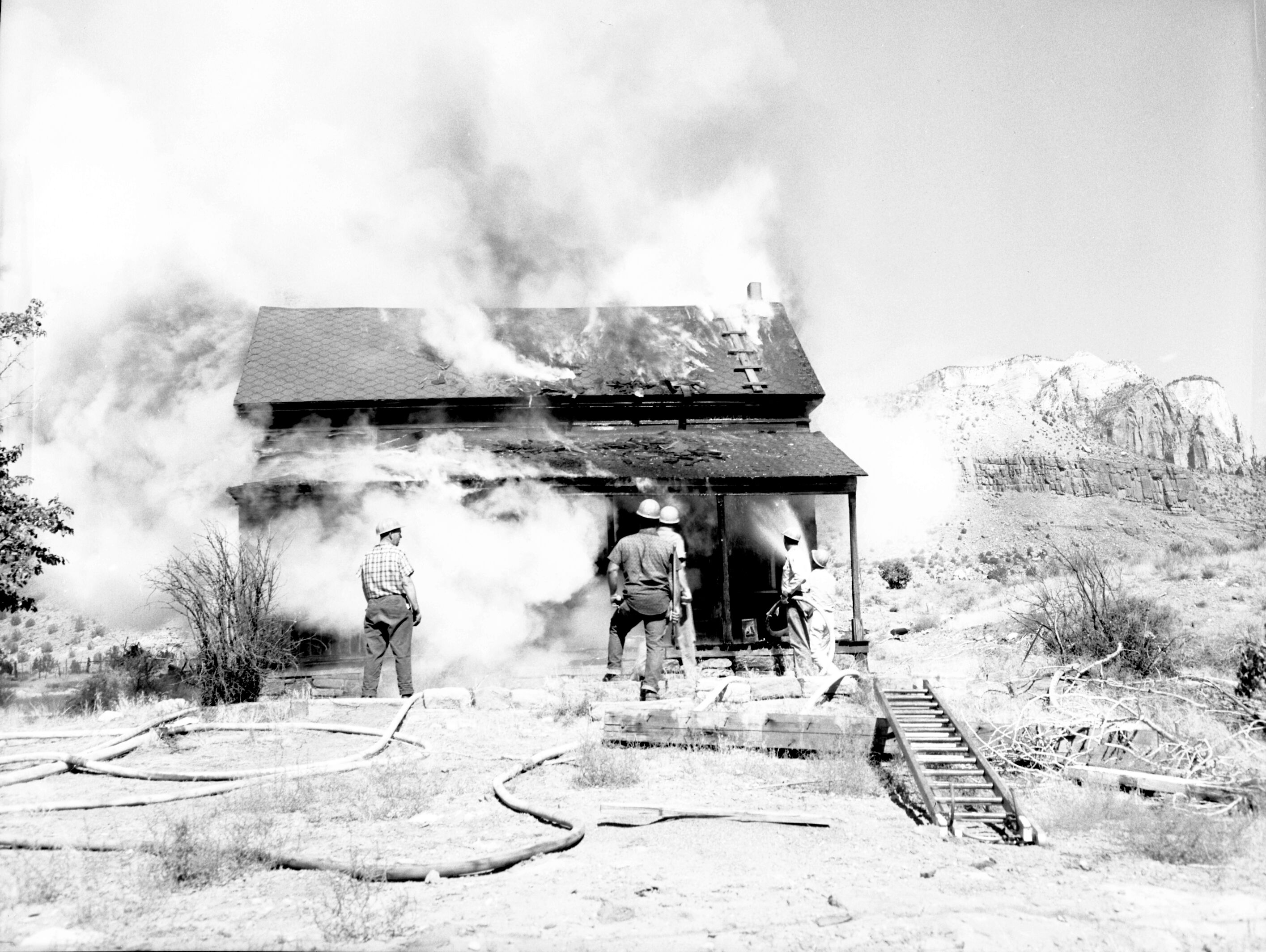 Fire prevention training; demonstration for students of Springdale school. Burning of old Justet home adjacent to Springdale school.