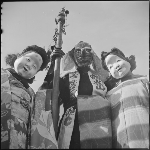 Three costumes that were worn in the Harvest Festival Parade held at this relocation center