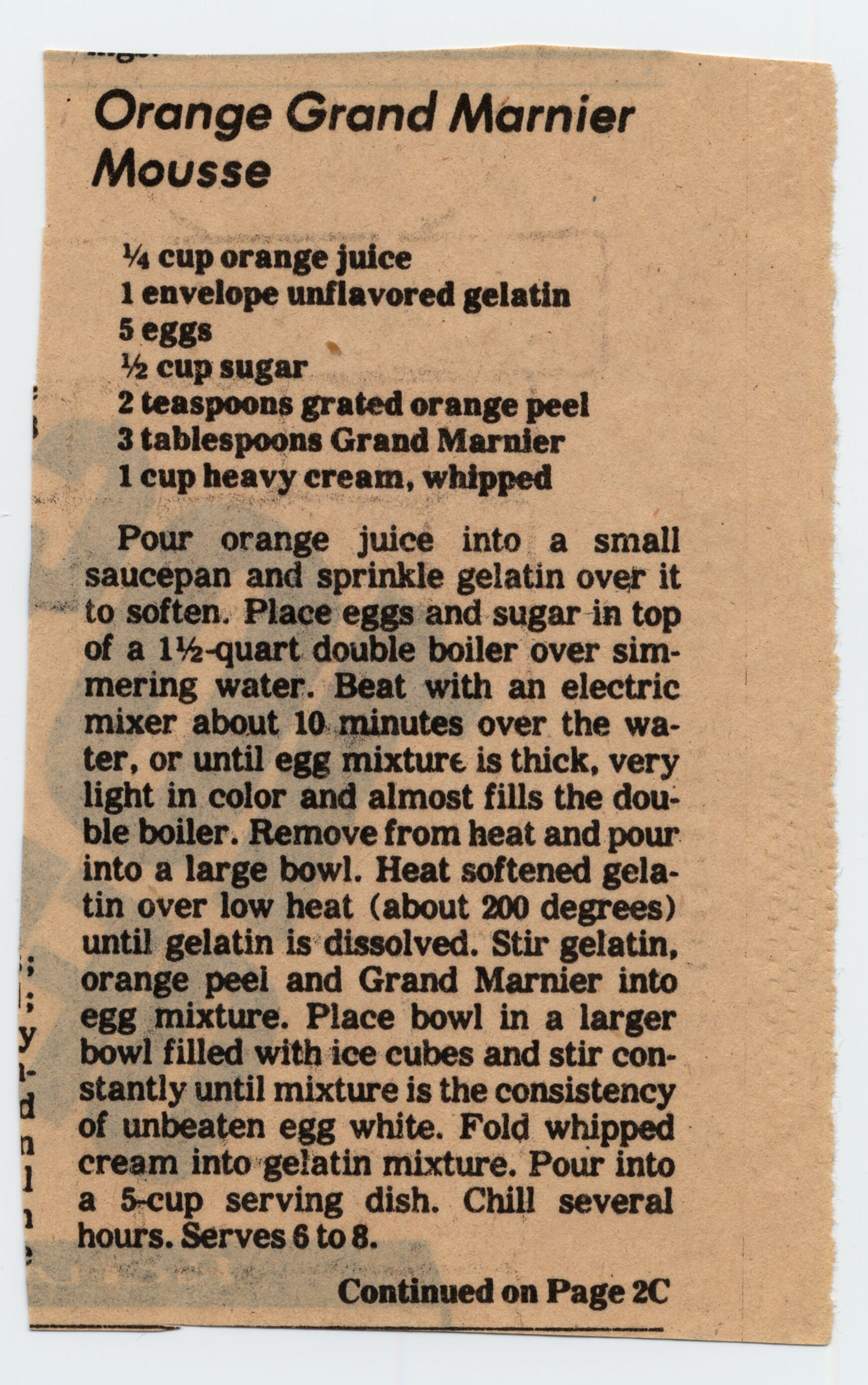 A recipe cut from a newspaper. An advertisement for flour is beneath the intro.