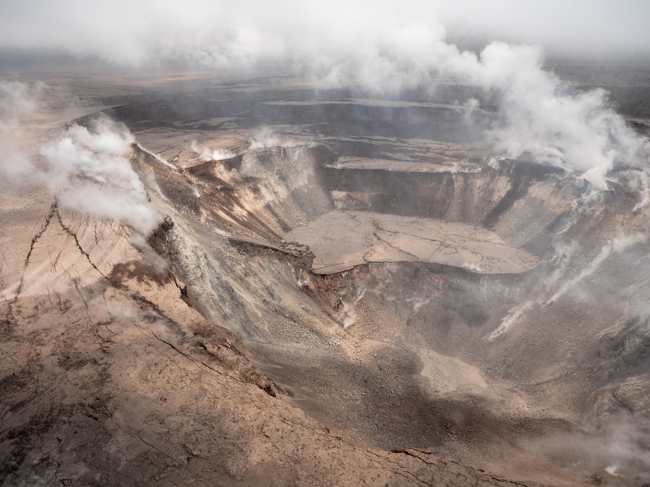 Collapsing and steaming volcanic crater, June 12th, 2018