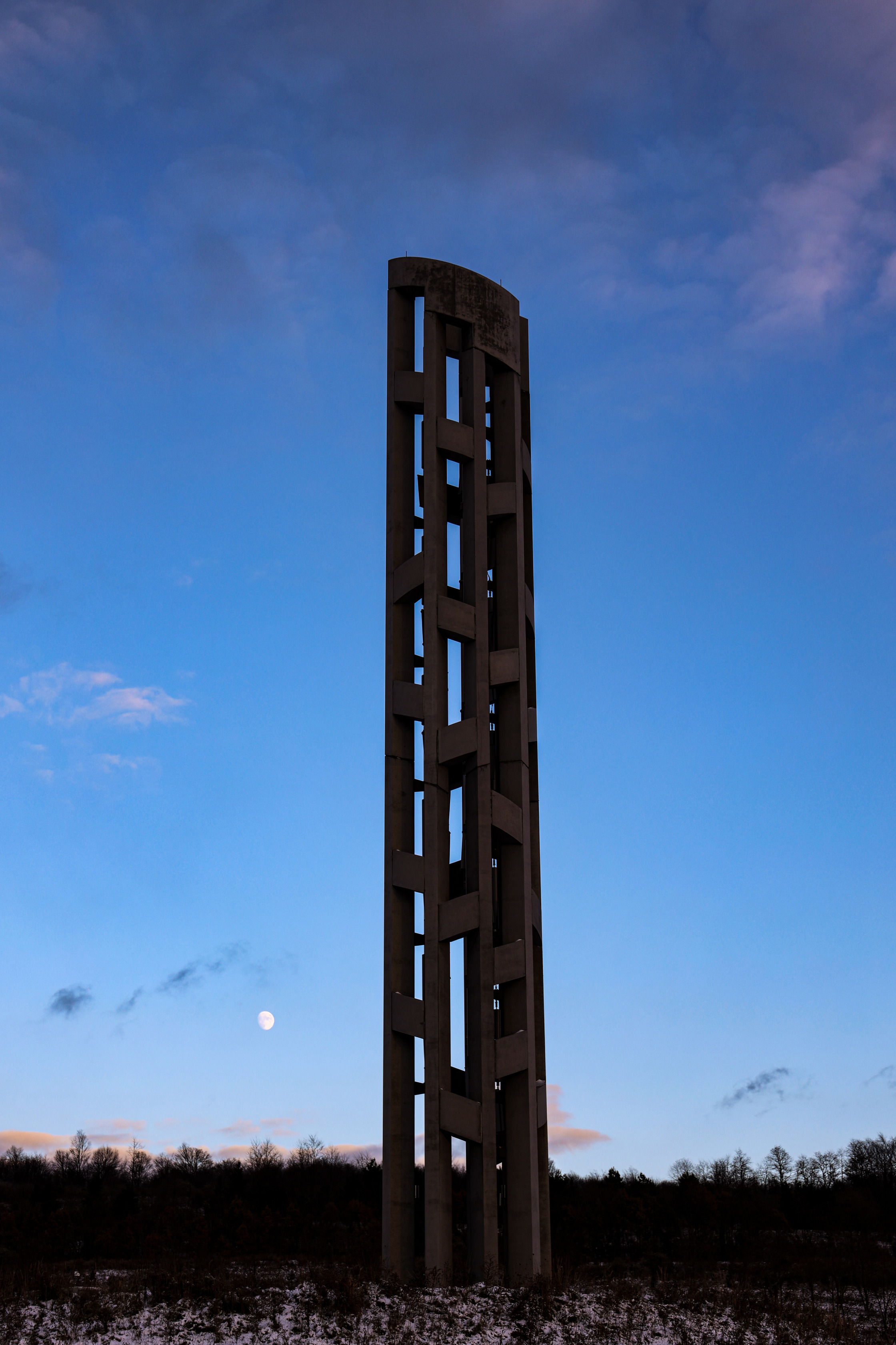 Snow laying on the ground near the Tower of Voices.