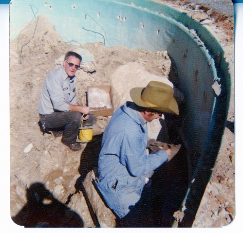 Workers during the destruction of the lodge pool and bathhouse.