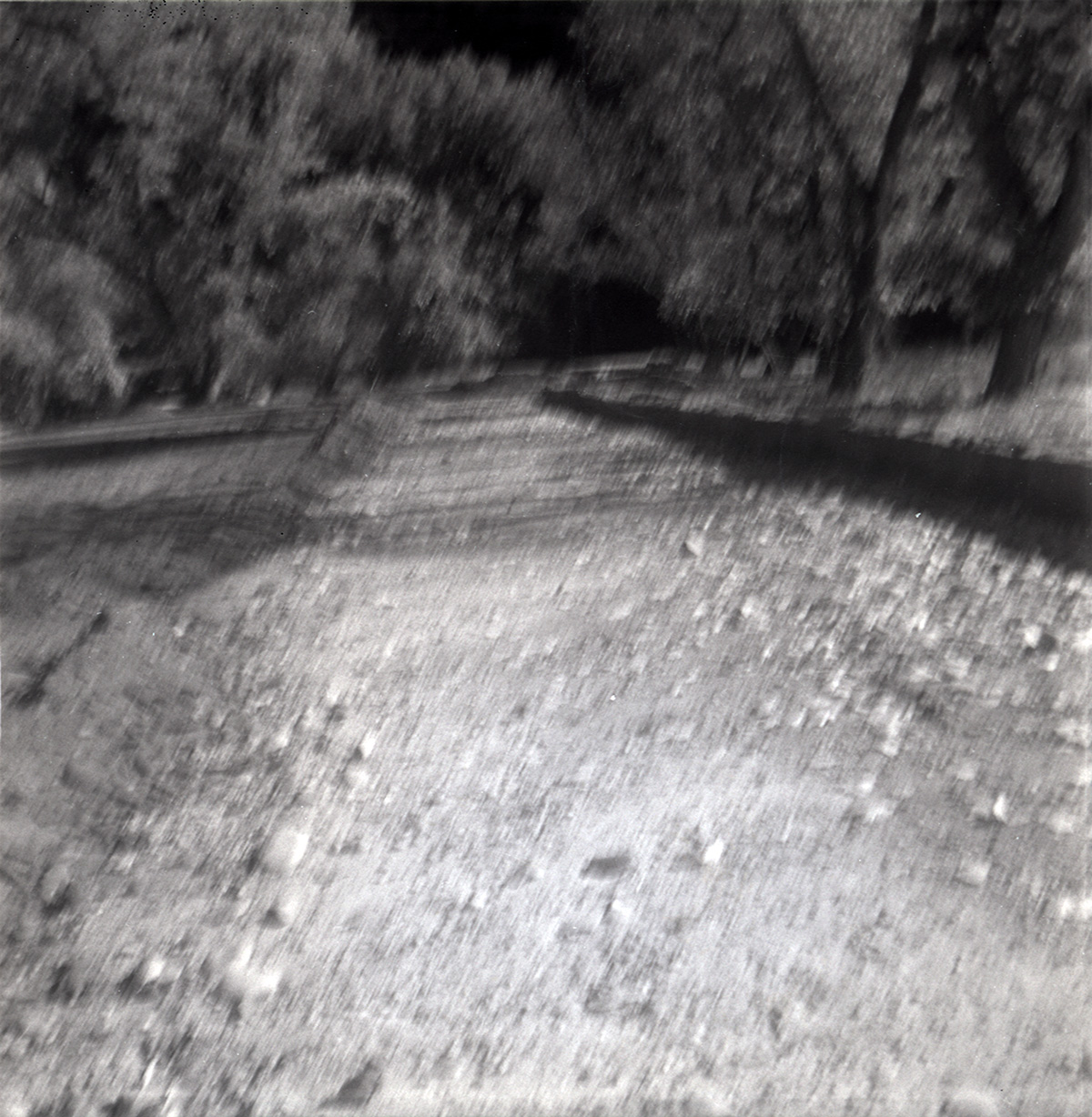 Dirt and gravel road along the scenic canyon drive near the Grotto during construction.