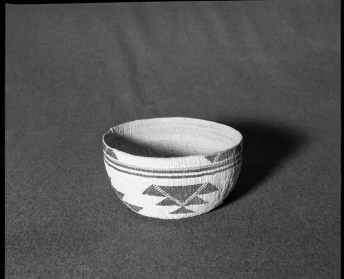 Marie Rozier Collection, Catalog No. 132. Object: Yurok/Karok/Hupa hat. Dimensions: 6 1/2 x 3-3/4". Materials: Conifer root, hazel shoots, beargrass, maidenhair fern stem. Collection History: Acquired from Mrs. S. M. Long. Collected in 1890s. Photographed by Michael Dixon in December 1982. Catalogued by Craig Bates and Barbara Beroza. Yosemite Collections, National Park Service.