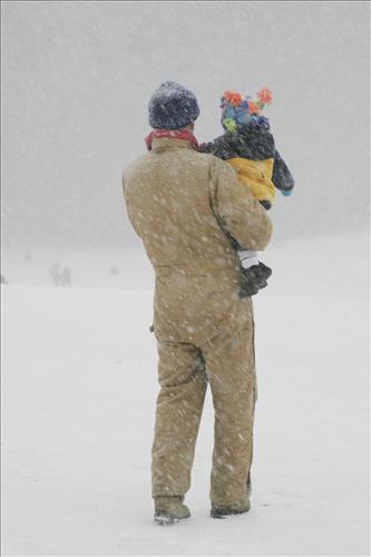 Sledding at Kendall Hills Adult and Child