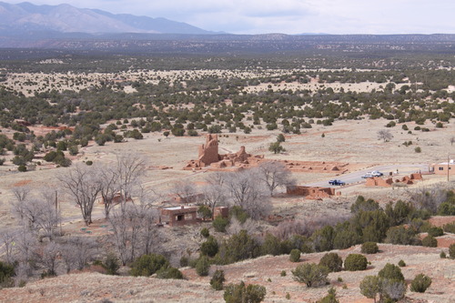  Photograph of the Abó unit. Photograph shows the historic structures of the Pueblo, modern National Park Service infrastructure, and surrounding landscape with the Manzano Mountains in the background. 