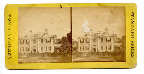 Two photos of facade of Georgian mansion side by side, taken at slightly different angles. Black and white sterograph.