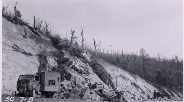 Rock slope showing source of masonry stone at Station 54