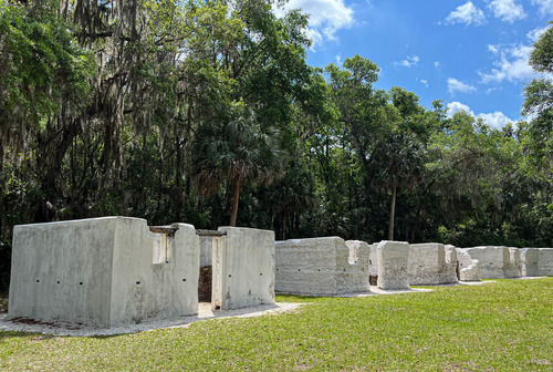 Remnants of a row of small rectangular historic homes made of tabby 
