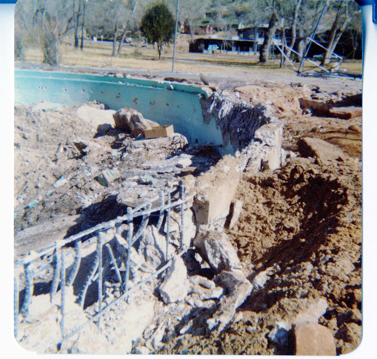 The destruction of the lodge pool and bathhouse.