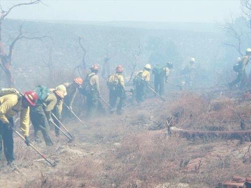 Fire fighters working on fire lines during the Long Mesa Fire, Mesa Verde National Park, July-August 2002