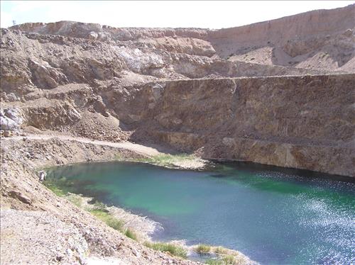 Morning Star Mine, an abandoned open pit gold mine with large waste rock piles.