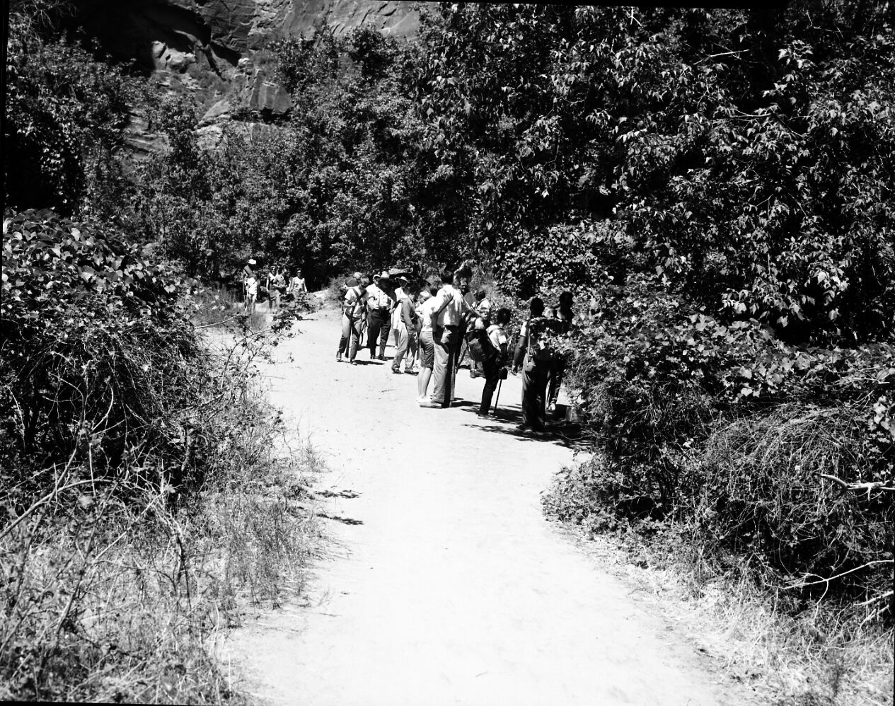 United State Representation King, his family, and Superintendent Hamilton at Bulloch's cabin on north fork of the Virgin River.