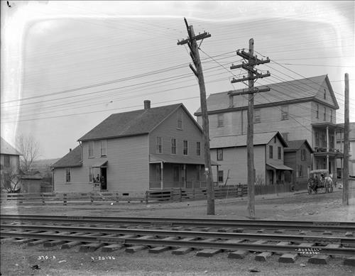 A0369-A0370--Unknown location--Frame House Alongside Railroad [1906.04.25]