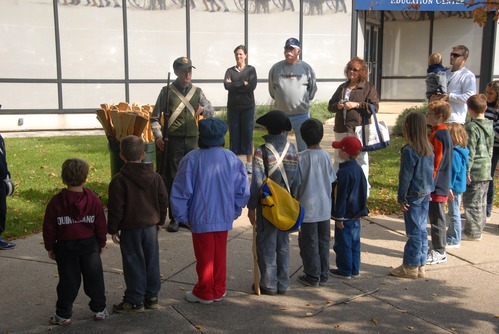 The new recruits line up in front of the Welcome Center for instruction.
