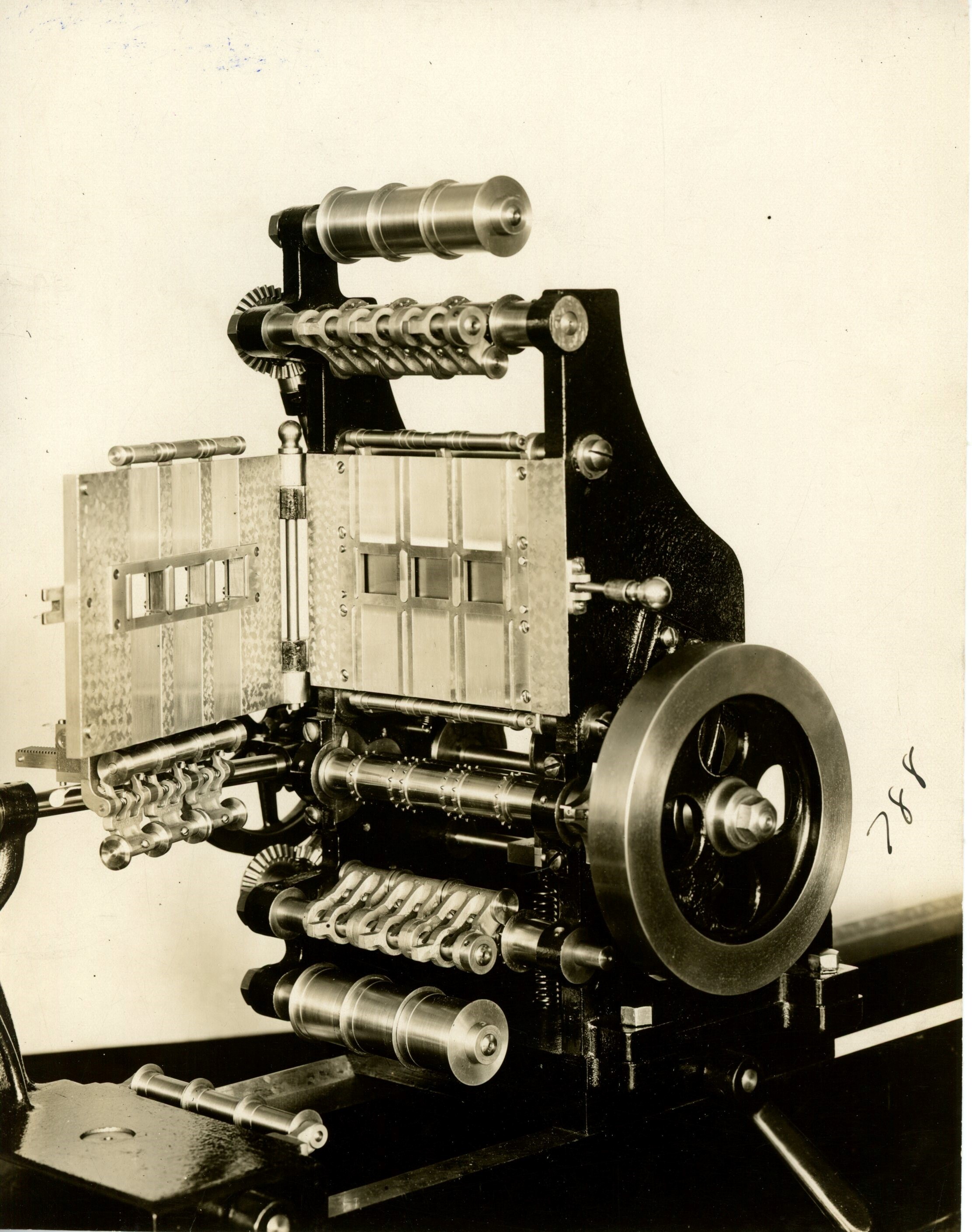 Edison home projecting kinetoscope, printer, negative head, gate open.