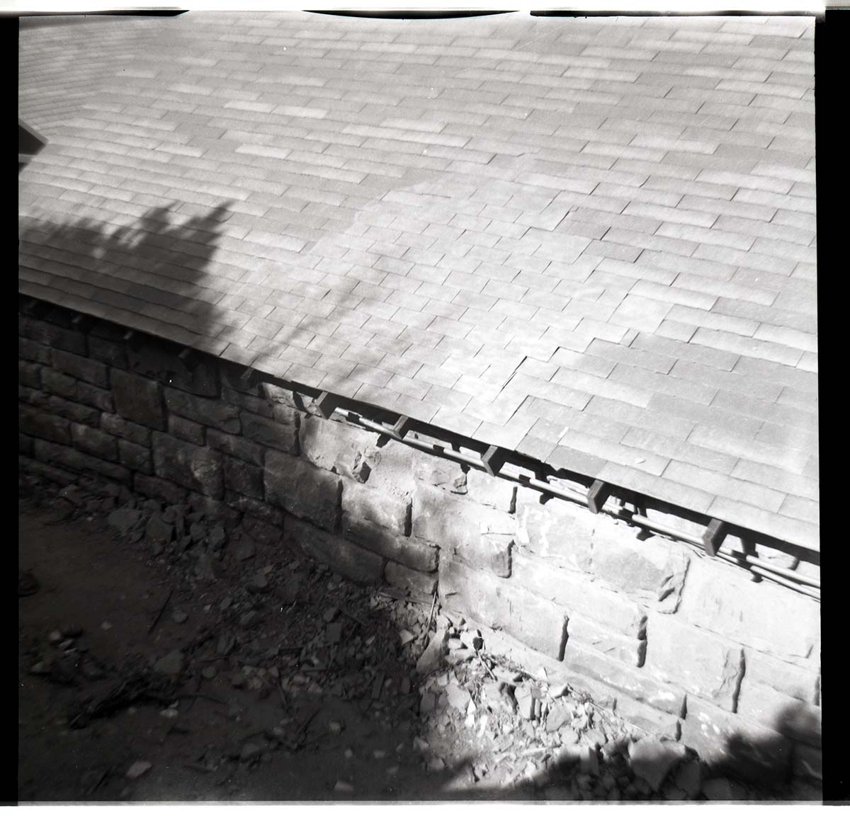 BW photo of rock slide in the maintenance yard.
