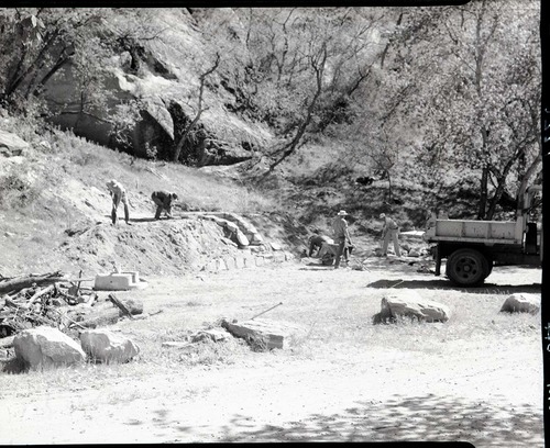 Construction of barbecue pit, NPS workers and truck at Grotto Campground.