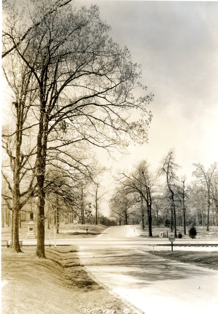 Old Battleground and New Garden Road 1937. Looking west Signers Monument and Washington's Visit Monument in background.