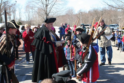 Soldiers are promoted to sergeant by General Washington at the President's Weekend Celebrations.