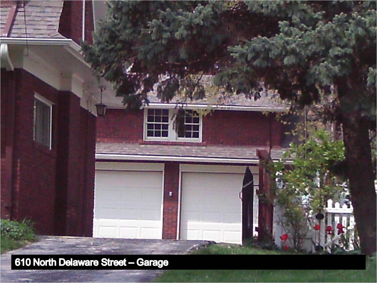 Image of a garage with a gabled roof.