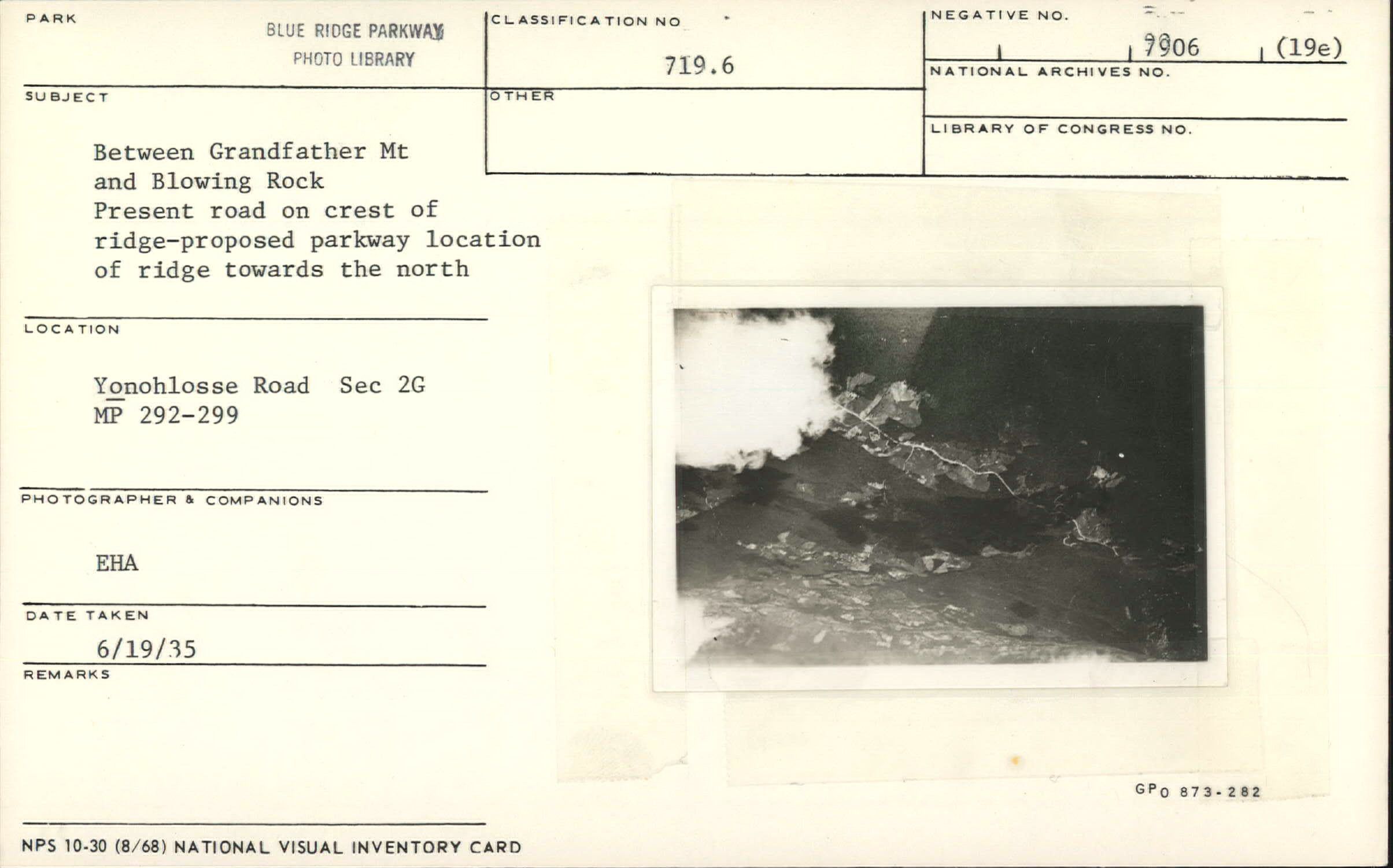 Aerial view showing present road on crest of ridge and proposed Parkway location on ridge towards the north