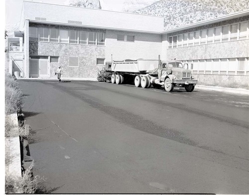 Laying of bituminous mat on roadway and parking area. Employee parking area, Mission 66 Visitor Center and Museum.