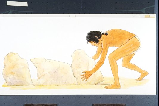 Scene depicts an ancestral Puebloan builder with "megaliths" or huge stones.