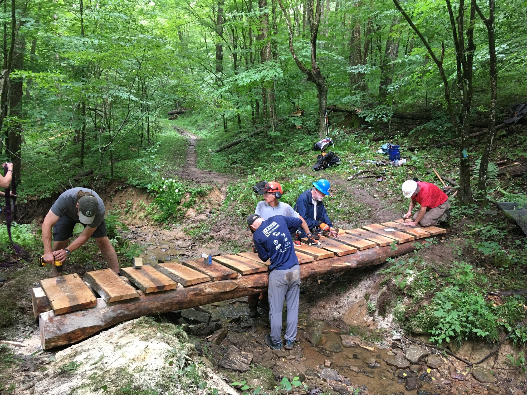 Trail volunteer crew constructs a bridge along the North Country National Scenic Trail