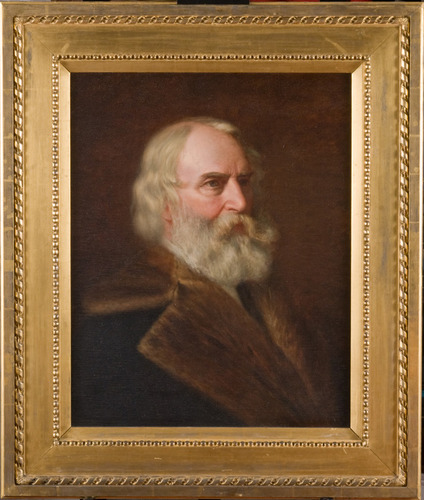 Bust-length portrait of Henry Longfellow with white hair and beard wearing fur collar, in gold frame