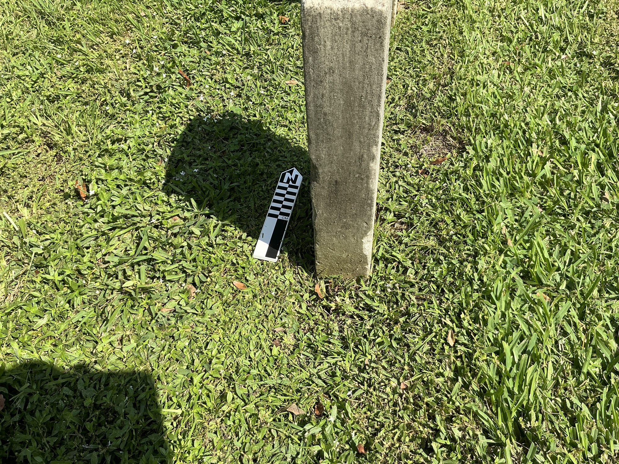Extra image of historic upright marble headstone with recessed shield face.