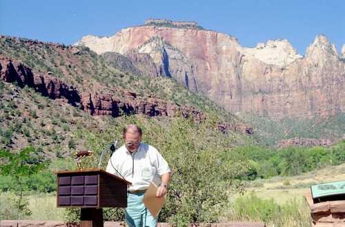 Color Photos of the parks 72nd anniversary celebrations- cake cutting, barbecue, speakers.