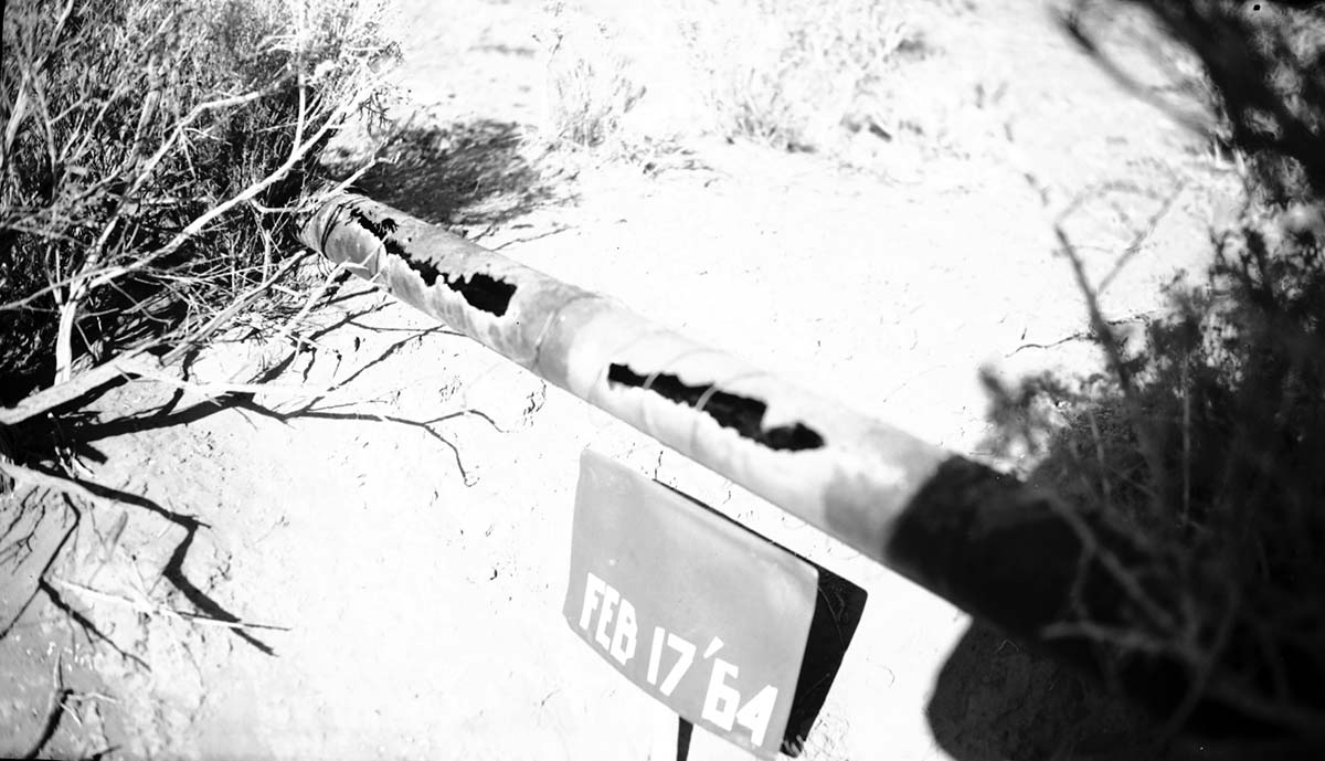 Unmaintained, above-ground section of Stockmen's waterline extensively damaged by rust. Pipe Spring area, on Kaibab Paiute reservation.
