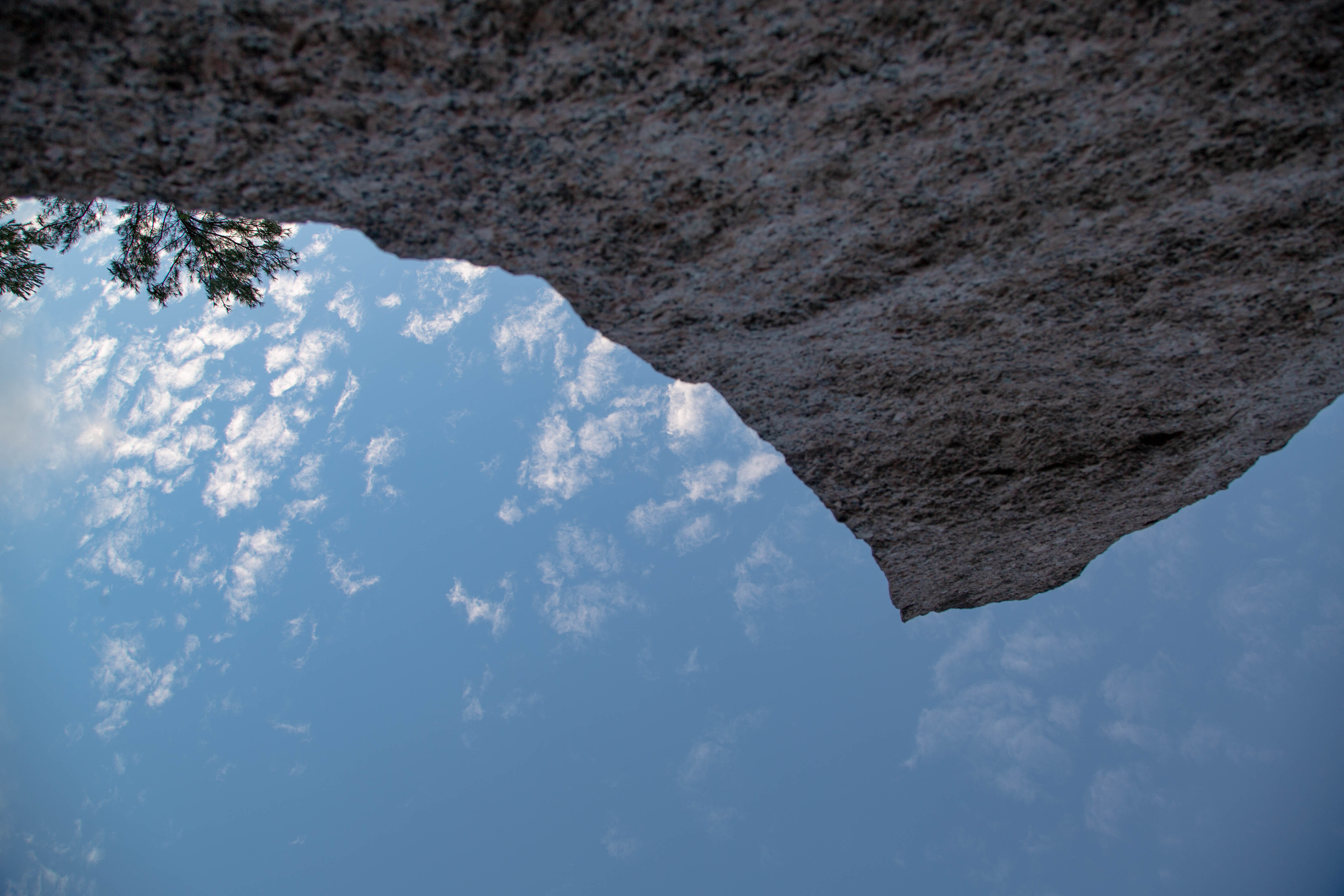 Upwards view from the base of a granite monolith