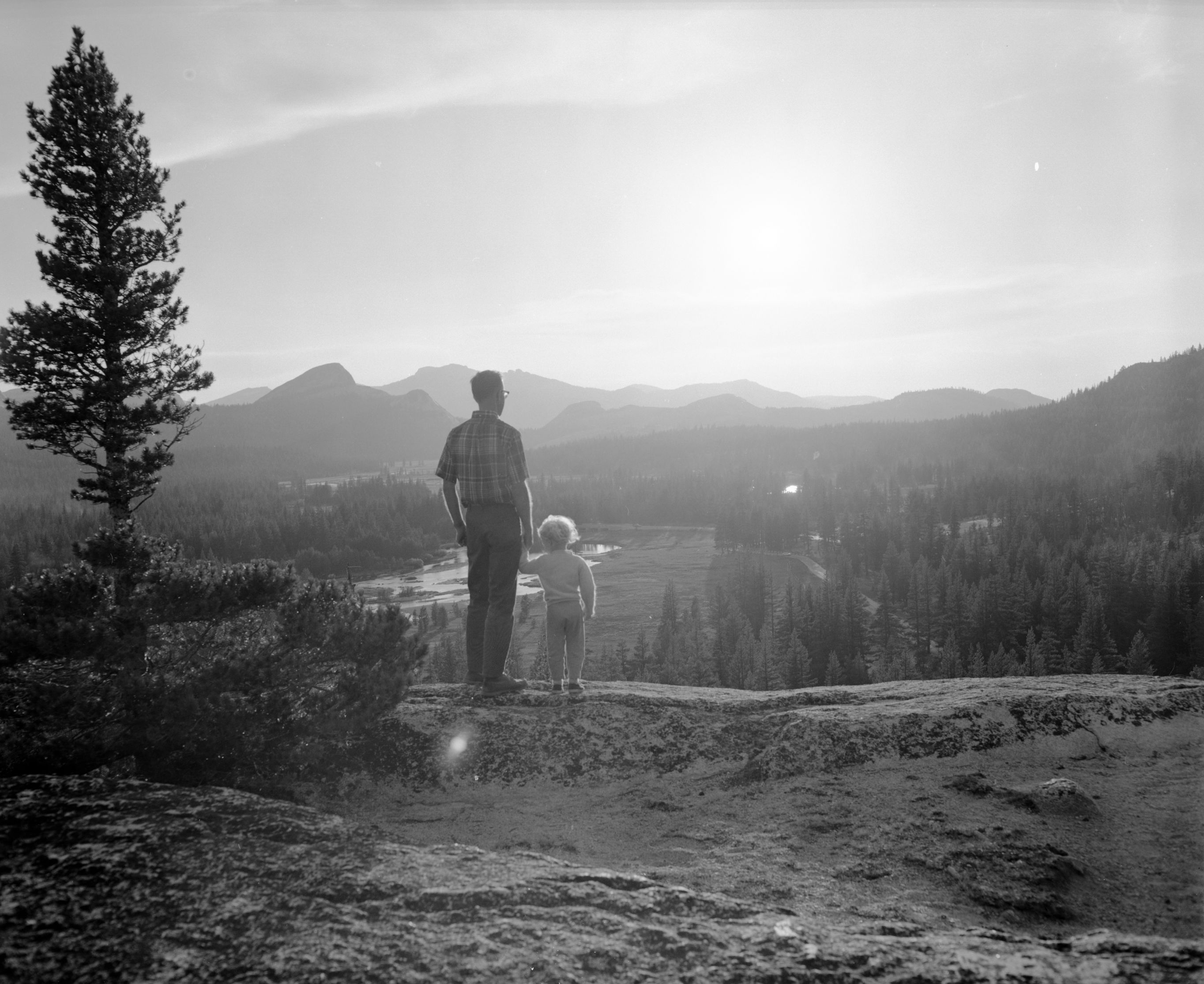 Visitors watching sunset at Tuolumne Meadows from Puppy Dome.