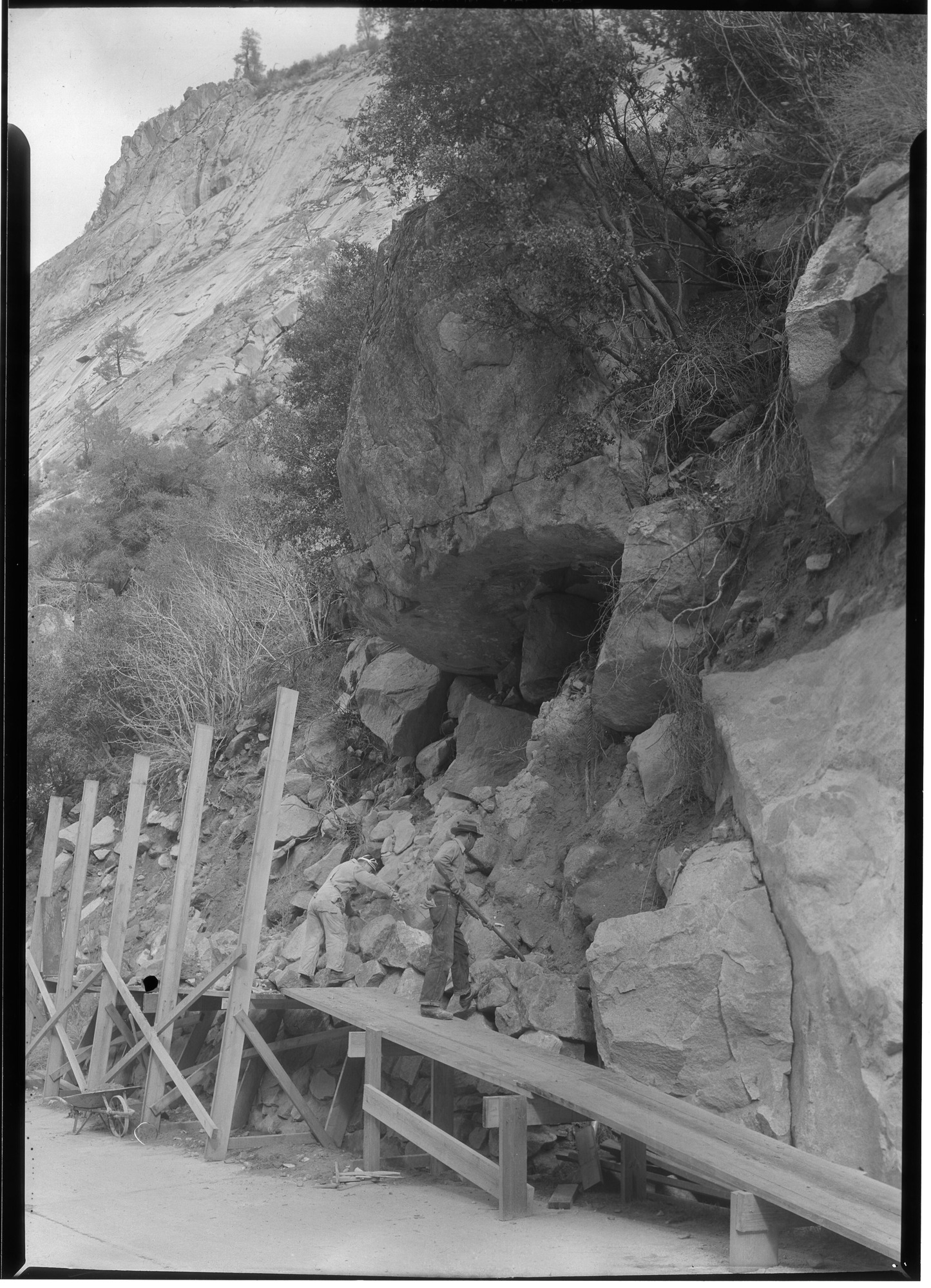 Stone Masons Erecting Retaining Wall
