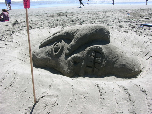 2014 Sand Sculpture Contest: Maggie Johnston Award for Creative Excellence Winner: Entry #12: Man before Coffee, by Pucci family