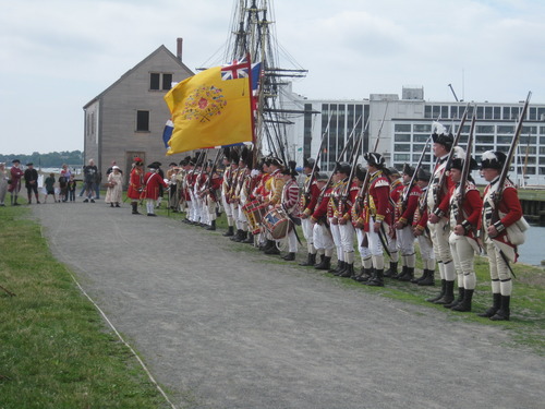 British Troops in red uniforms standing in a line