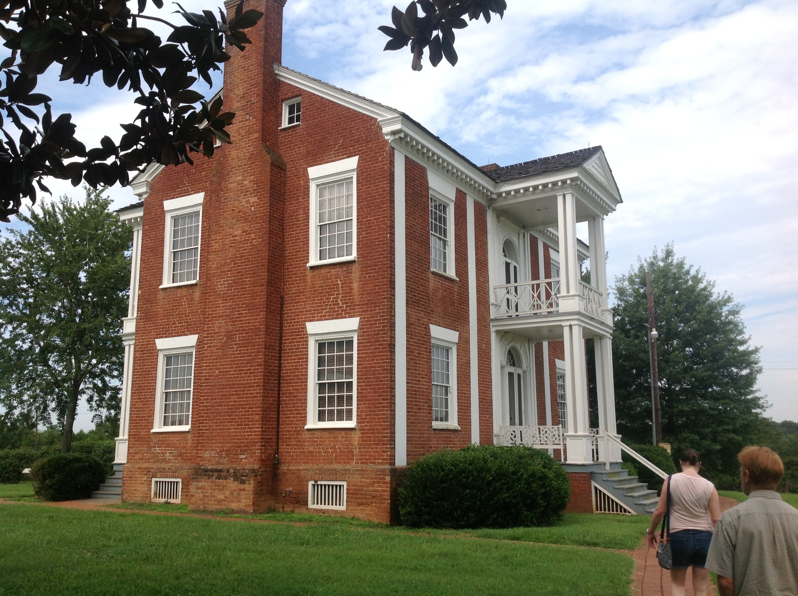 A large red brick house.