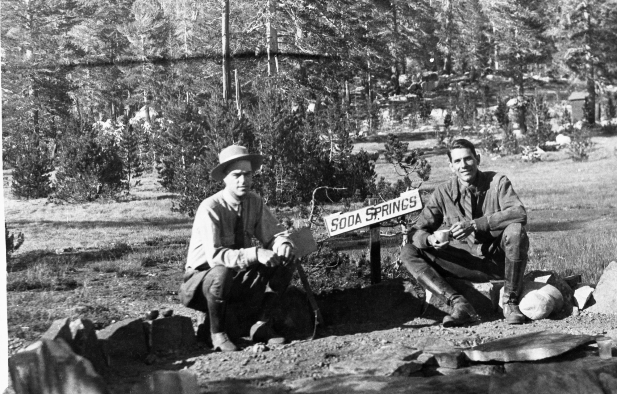 W.B. Lewis & Don Tressider at Soda Springs in Tuolumne Meadows. "Enjoying a drink of Bubble Water on the Tioga Road in Tuolumne Meadows, YNP." Copied by J. Ernest, 1983.