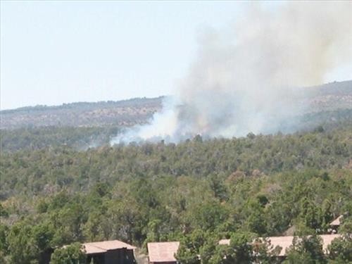 Photos of white smoke indicating start of the fire on the first day of Long Mesa Fire, Mesa Verde National Park, July 29, 2002