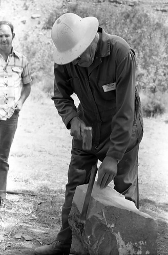 Second annual Folklife Festival, Zion National Park Nature Center on September 1978. Jim Felton demonstrates stone cutting to park employee.