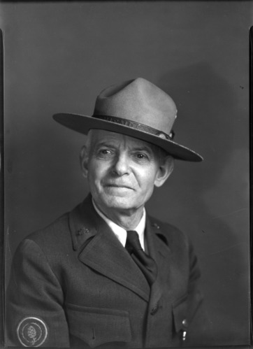 Ranger Billy Nelson, taken for the Yosemite edition of the Mariposa Gazette. "NELSON, WILLIAM HENRY. Yosemite Nat'l Park. November 21, 1951. Born July 21, 1873 at Merced Falls, Calif. and still living at Mariposa, Calif. Was a popular old-time ranger in Yosemite, from June 1, 1917 to November 30, 1945. He conducted many celebrities on High Sierra pack trips; was closely associated with Stephen T. Mather, and was later in charge of Yosemite Valley Campgrounds which he administered with the aid of his famous white horse "Shiek". Biographical reference: Albright and Taylor's Oh Ranger."
