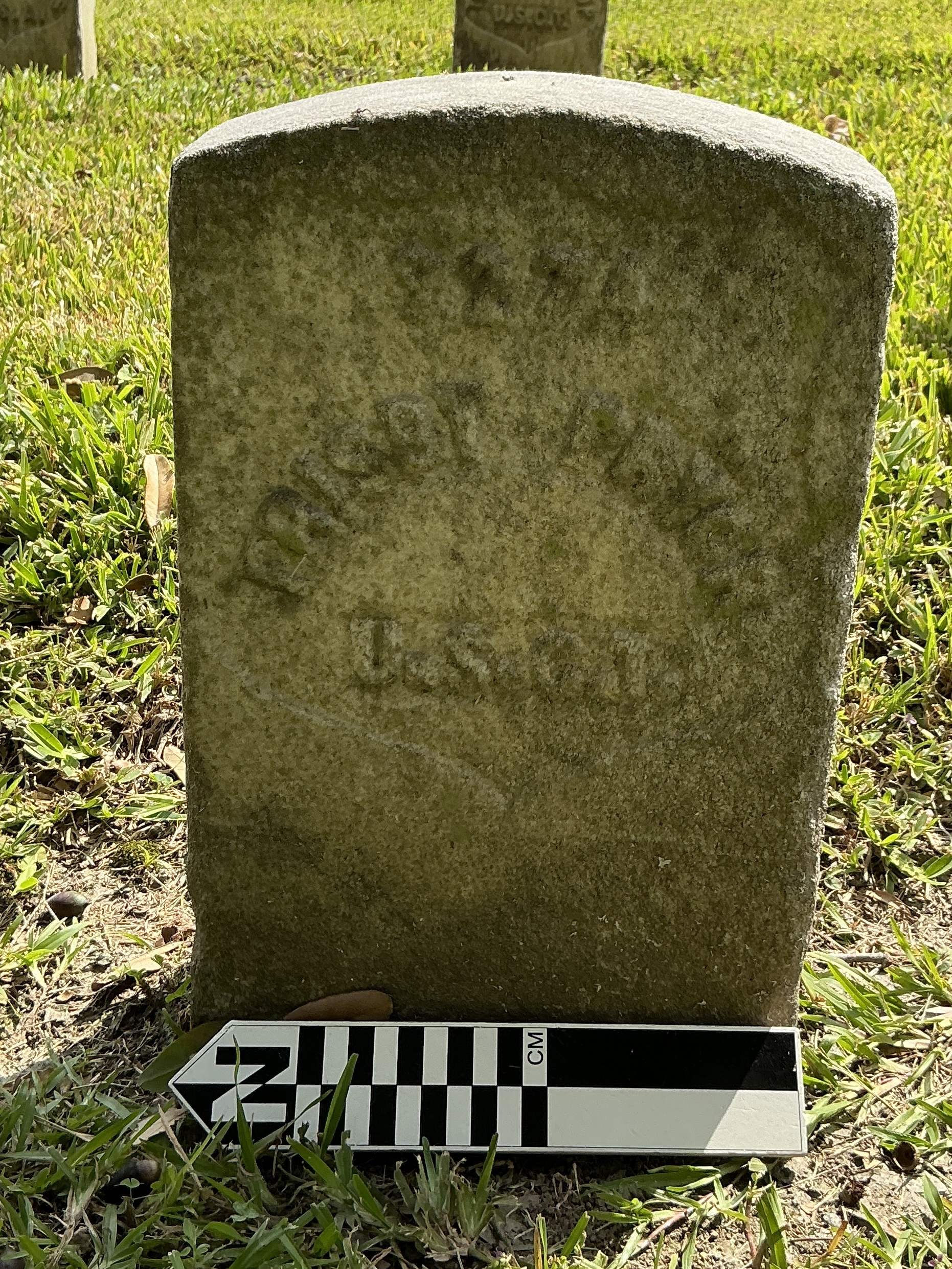 Extra image of historic upright marble headstone with recessed shield with recessed lettering face.