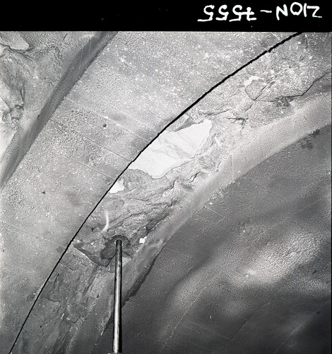 Drilling equipment and operator obtaining test cores in Zion-Mt. Carmel tunnel.