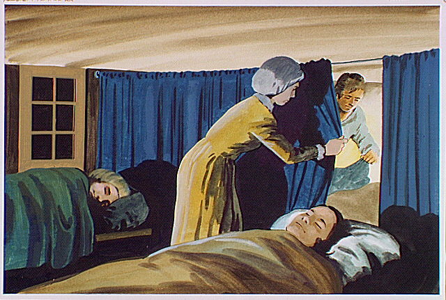 The boards used as tables during meals were also used as shelving for bunks during the night.